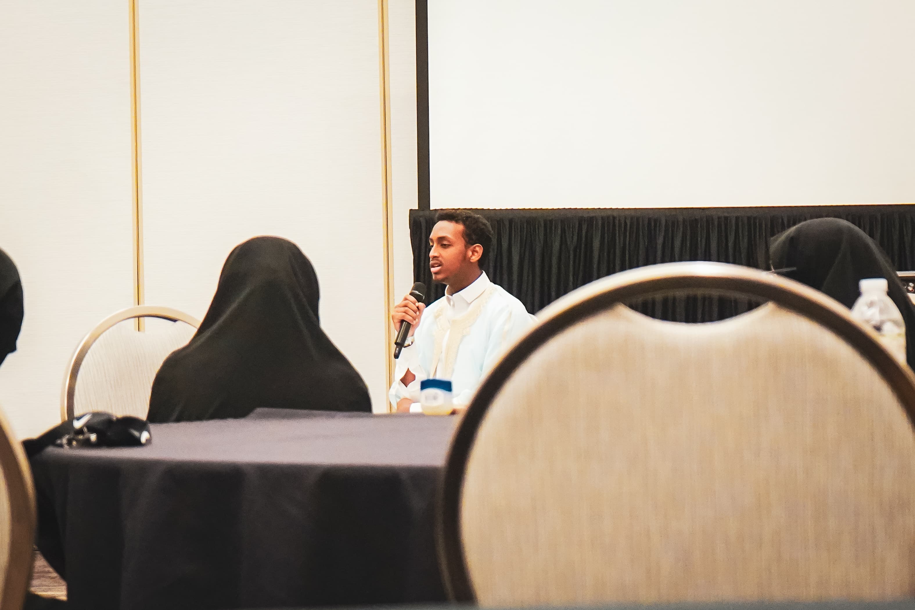 Students reciting Quran at the IANA Minnesota Quran Competition